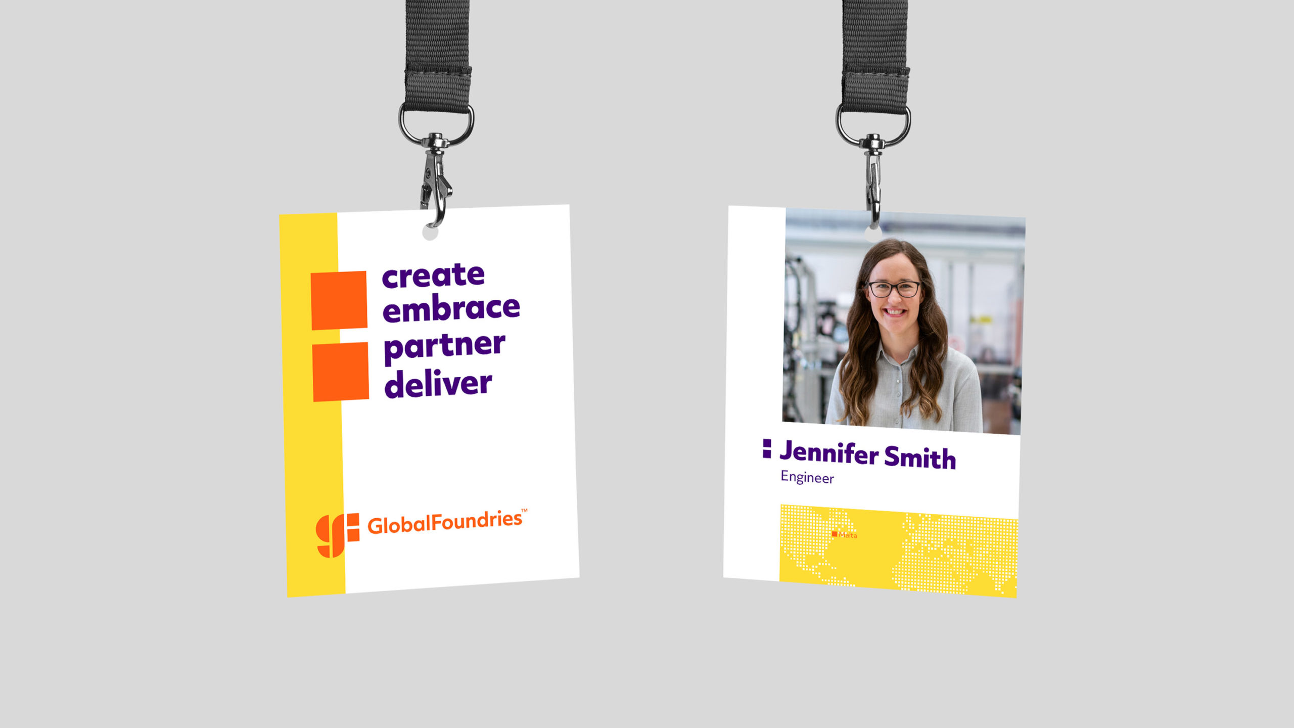 Global Foundries Badges featuring an employee and text that says “create embrace partner deliver”
