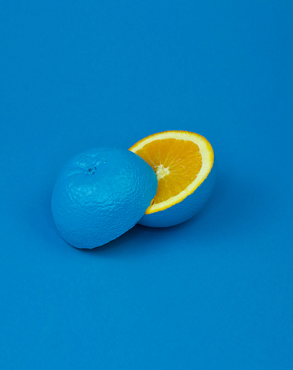 Blue Lemon Cut in half in a blue room, brilliant brands have little in common