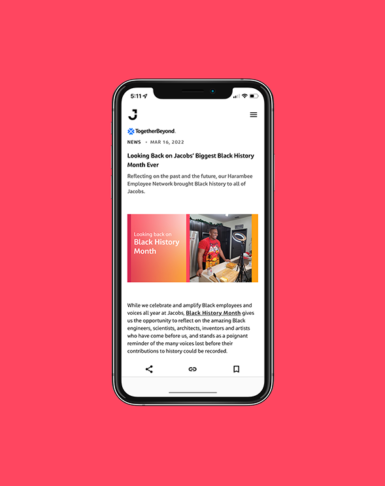 Jacobs.com New Website Design on an iphone over a red background showcasing a new brand experience